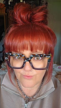 Absolutely in love.  Big glasses for a big personality0